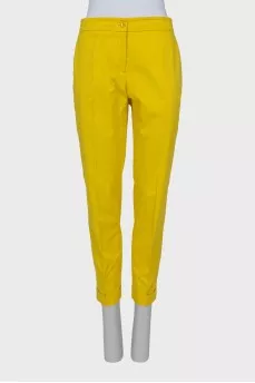 Yellow suit consisting of a jacket and trousers