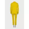 Yellow suit consisting of a jacket and trousers