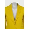 Yellow suit consisting of a jacket and trousers