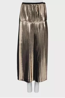Pleated skirt in gold color