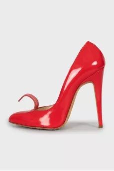 Red shoes with a figured cutout