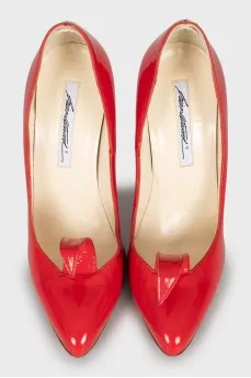 Red shoes with a figured cutout