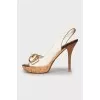 Leather sandals with gold buckles