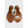 Leather sandals with gold buckles