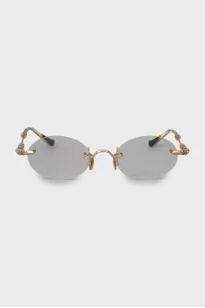 Gold colored glasses frame