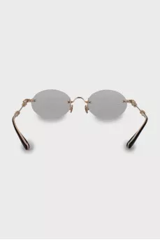 Gold colored glasses frame