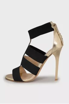 Black and gold stiletto sandals