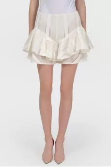 Shorts made of translucent material with stuck with tag