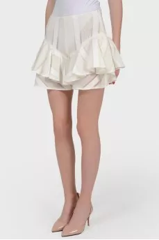 Shorts made of translucent material with stuck with tag