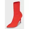 Red stiletto ankle boots