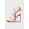 Stiletto heel sandals decorated with flowers