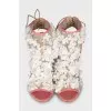 Stiletto heel sandals decorated with flowers