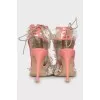 Stiletto heel sandals decorated with flowers
