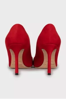 Red suede pumps