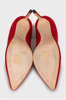 Red suede pumps