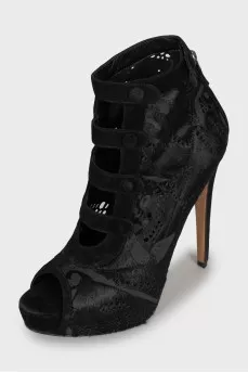 Suede ankle boots with perforation
