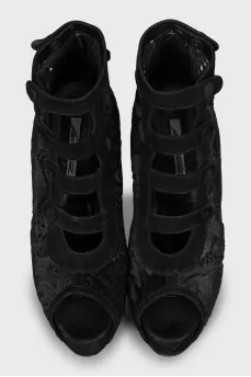 Suede ankle boots with perforation