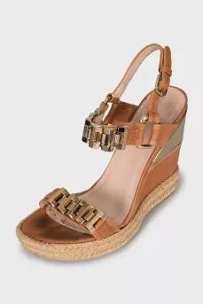 Wedge sandals with gold hardware