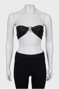 Top with gold element at the front