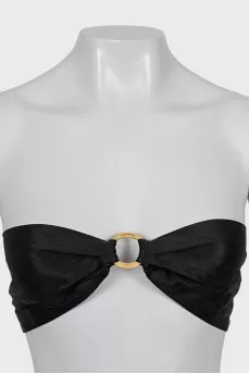Top with gold element at the front