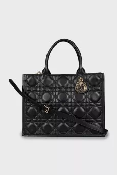 Leather bag with branded keychain