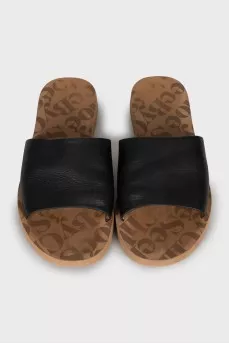 Black flip flops with leather upper