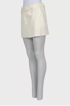 Denim skirt with raw hem
