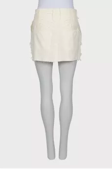 Denim skirt with raw hem