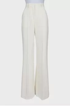White flared trousers