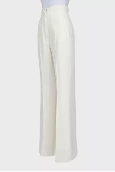 White flared trousers