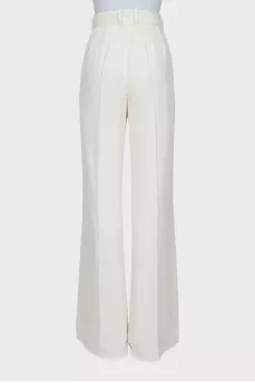White flared trousers