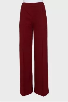 Red straight-leg trousers with creases