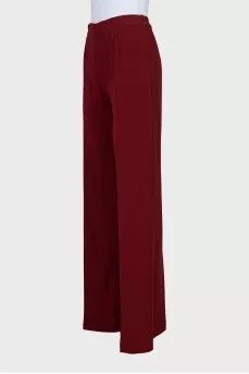 Red straight-leg trousers with creases