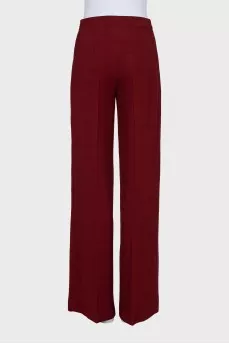 Red straight-leg trousers with creases