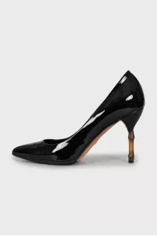 Leather shoes with a figured stiletto heel