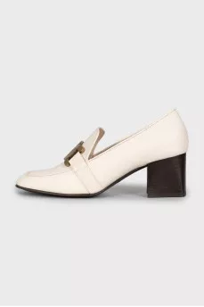 White leather shoes with medium heels