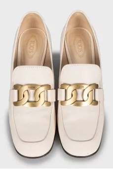 White leather shoes with medium heels