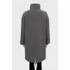 Reversible grey jacket with tag