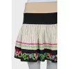 Skirt decorated with embroidery