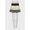 Skirt decorated with embroidery