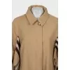 Coat with checkered trim