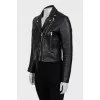 Leather jacket decorated with fringe