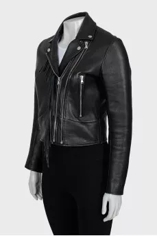 Leather jacket decorated with fringe