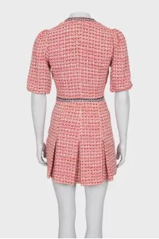 Fitted dress decorated with buttons