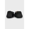 Black leather moccasins