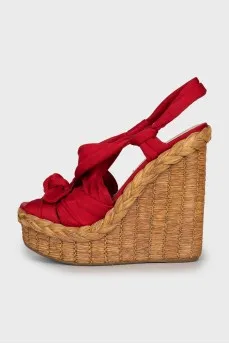 Red sandals with woven soles