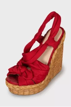 Red sandals with woven soles