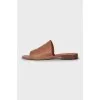 Brown leather flip flops