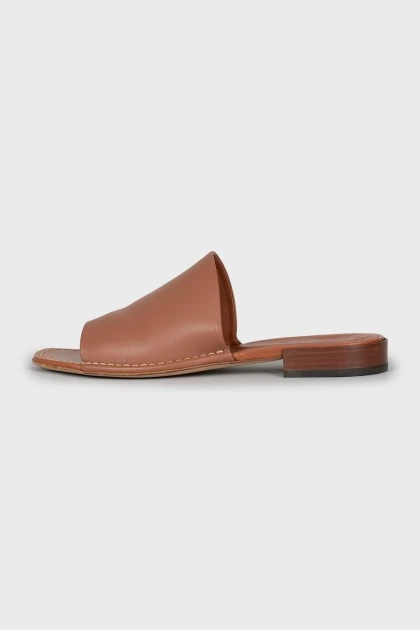 Brown leather flip flops