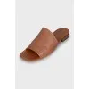 Brown leather flip flops